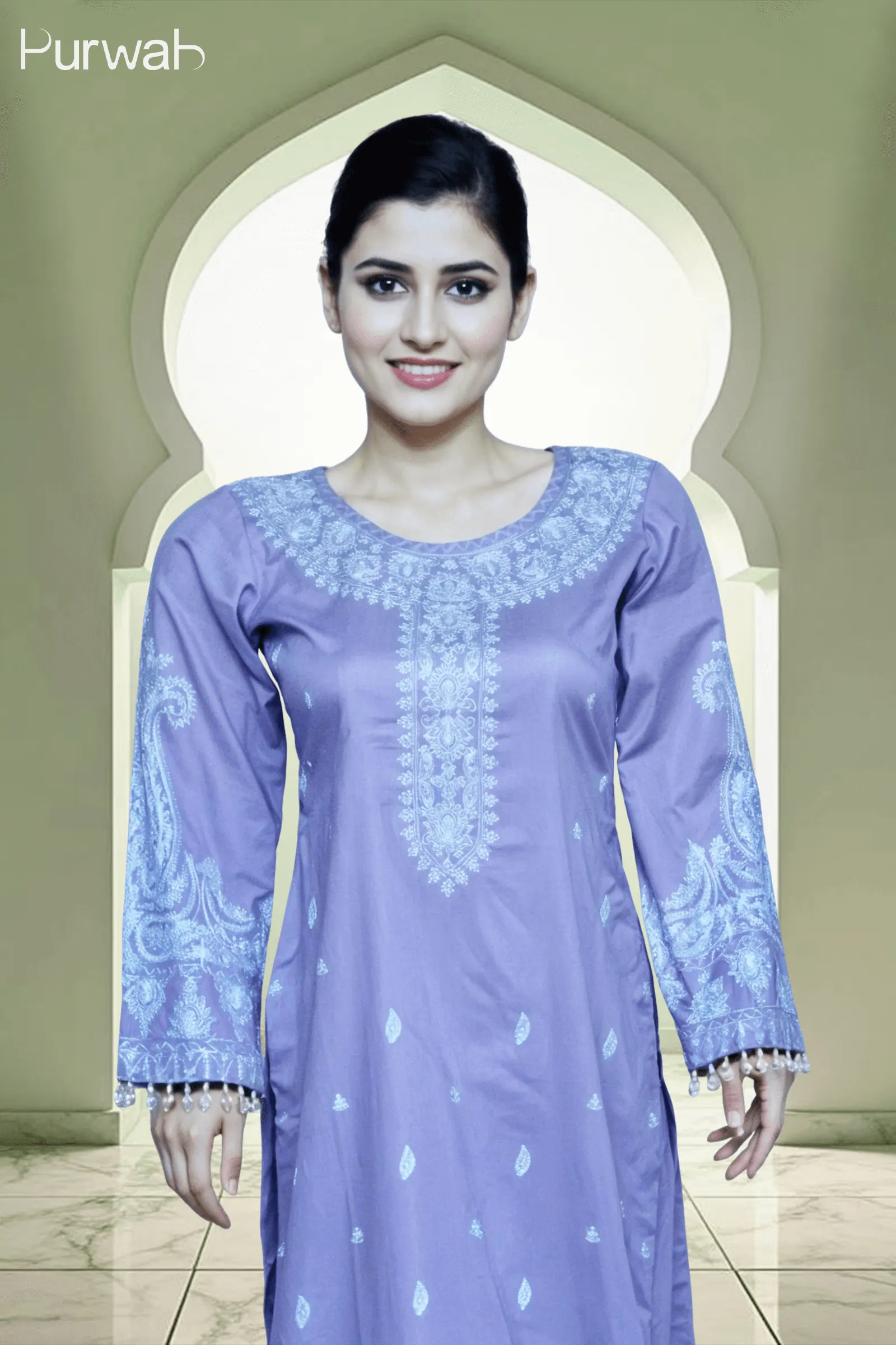 A woman wearing a purple embroidered kurta with long sleeves, posing against a traditional arched background. The design features intricate blue patterns on the front and sleeves.