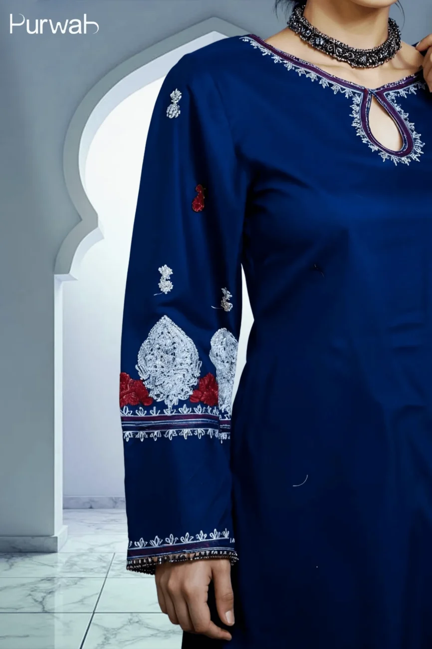Close-up of a royal blue dress with detailed floral embroidery on the sleeves and neckline, with a model wearing a black choker.