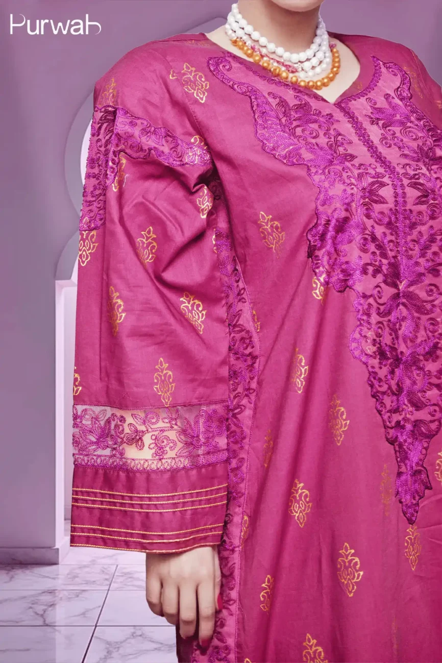 Magenta embroidered dress with gold floral designs, styled with a matching magenta veil and choker necklace, highlighting the luxurious look.
